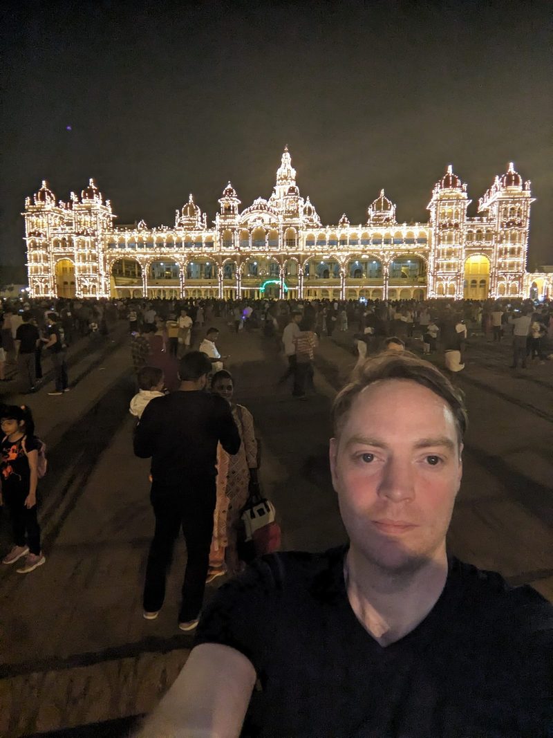 Ken in front of Mysore Palace, lit up